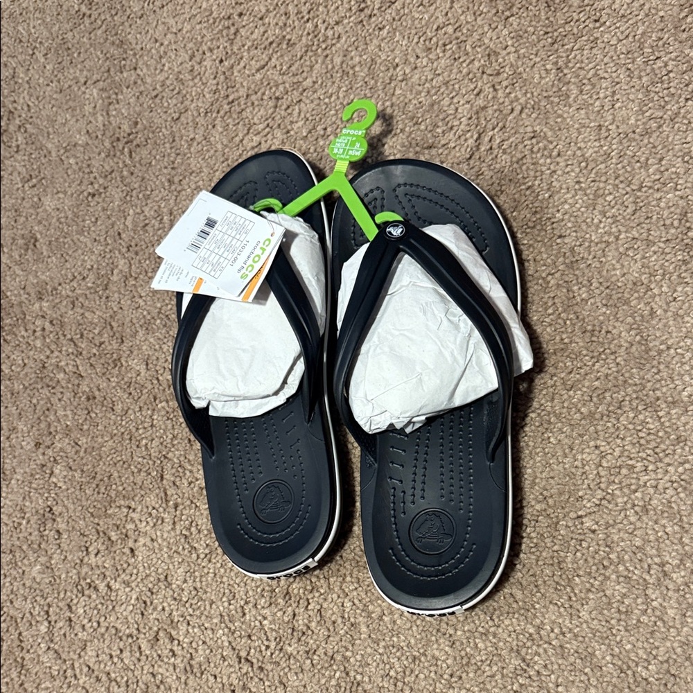 New women’s crocs flip flops